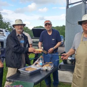 Larry VA3FHG, Doug VA3DCE and Joe VE3VGJ working the grill in full force for us.